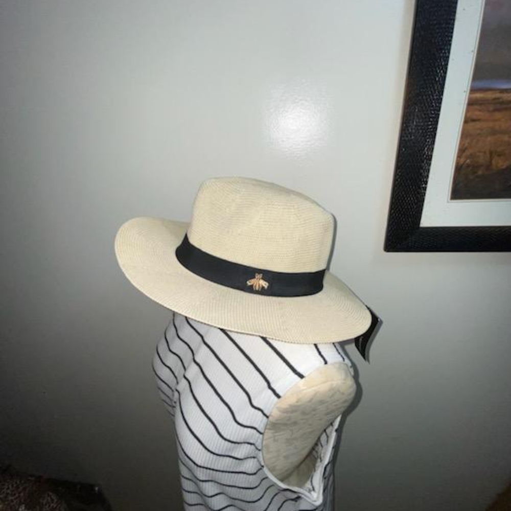 Elegant Cream Hat with Black Band